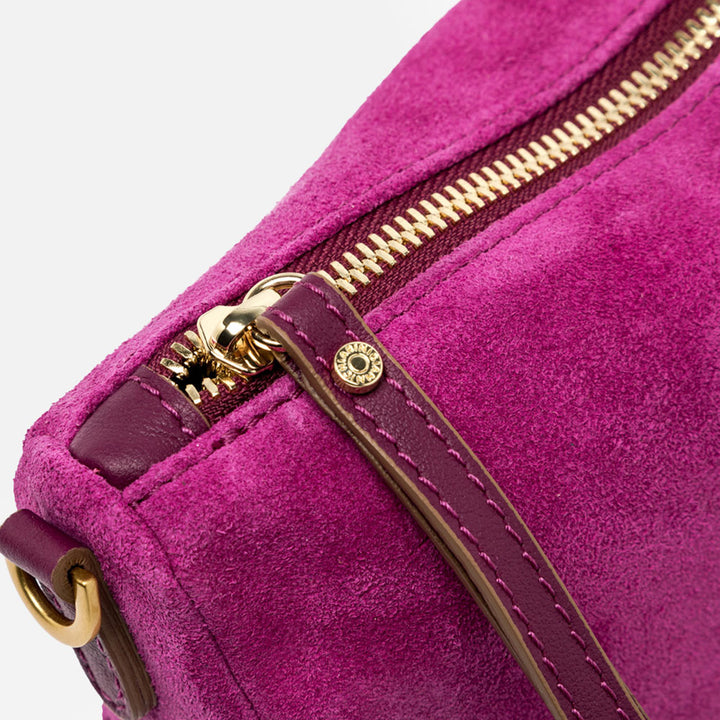 bright pink suede wristlet pouch bag with pink leather wrist strap