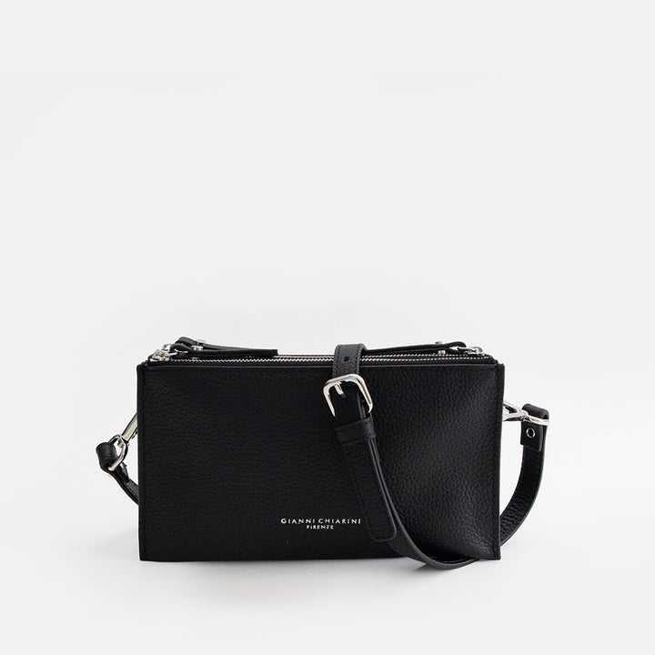 black leather envelope handbag on a light grey background