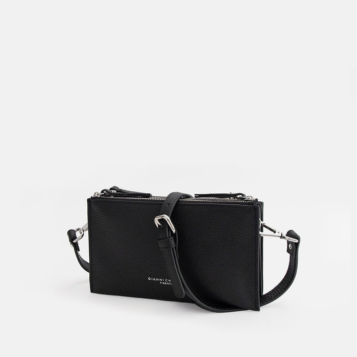 black leather envelope handbag on a light grey background