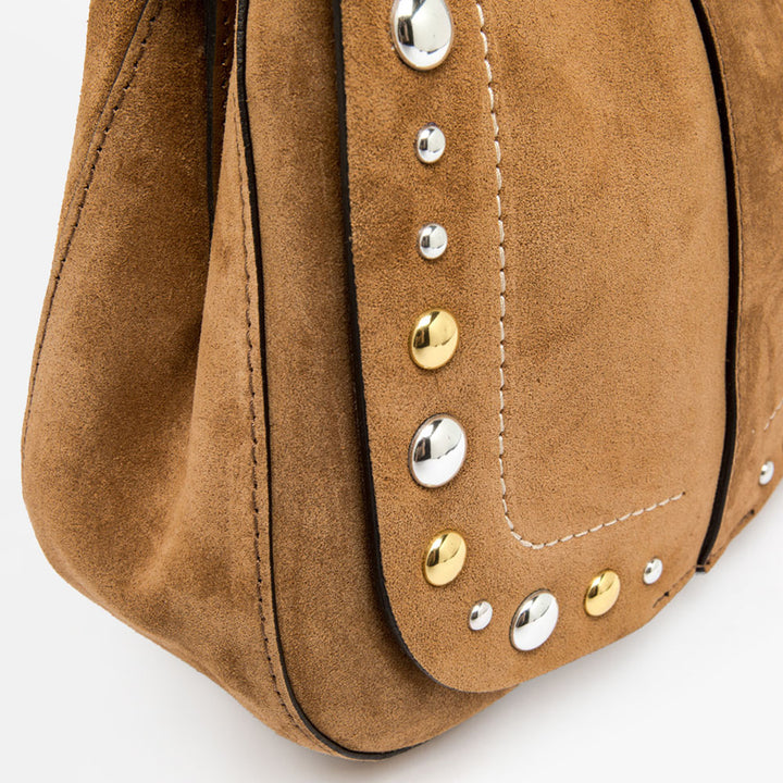 brown suede saddle bag with contrast stitching, silver & gold studs and leather shoulder and crossbody straps