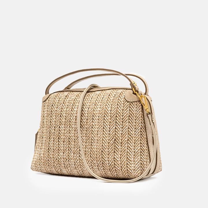 Woven handbag with a strap on a light grey background