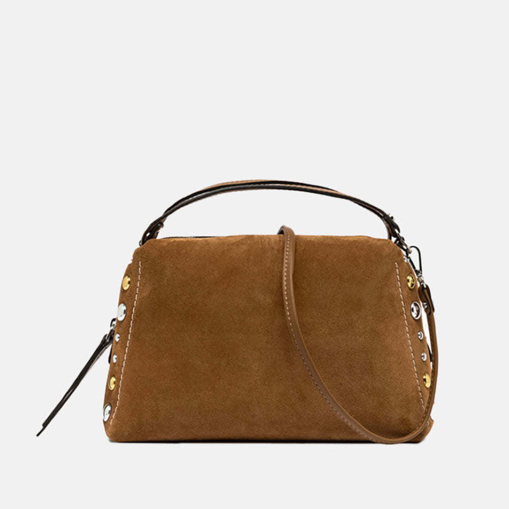 brown suede handbag with tonal grab handle and crossbody strap and studded with gold & silver studs