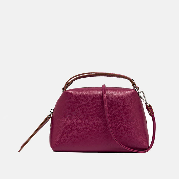 pink leather handbag with matching leather strap