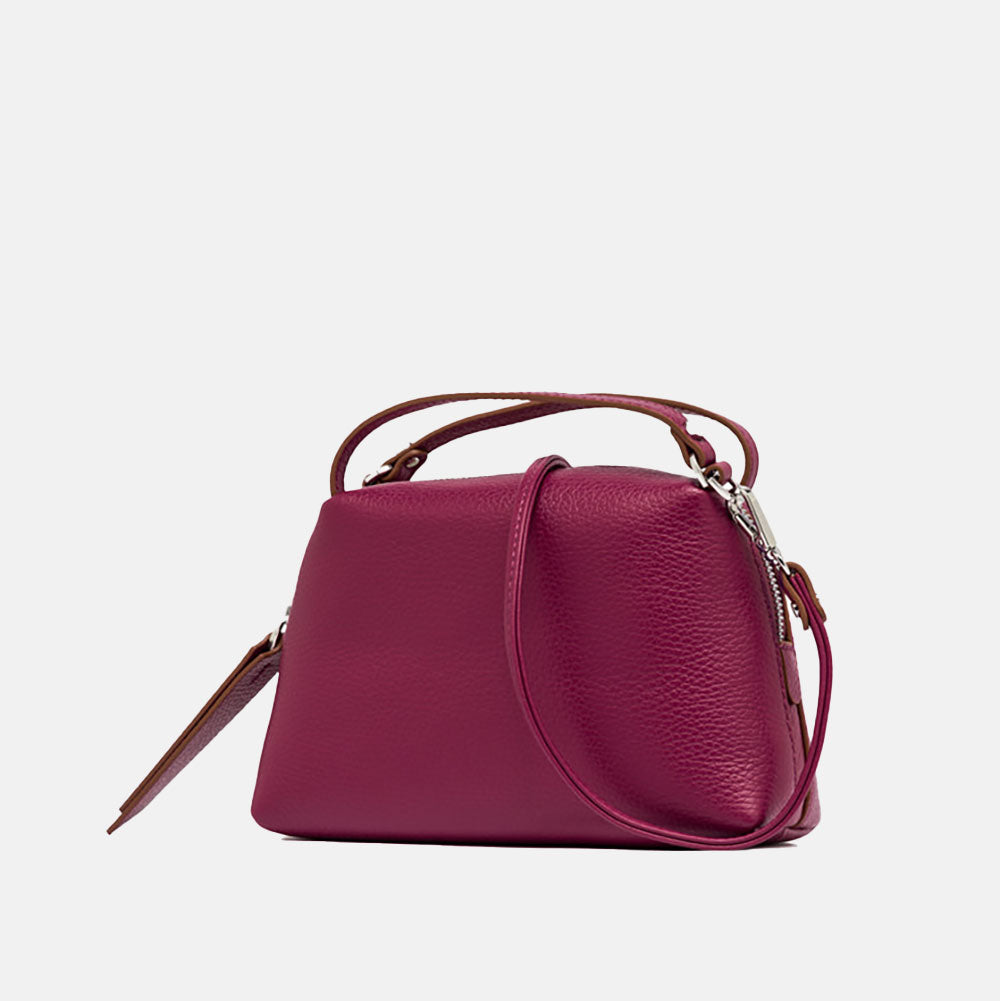 pink leather handbag with matching leather strap