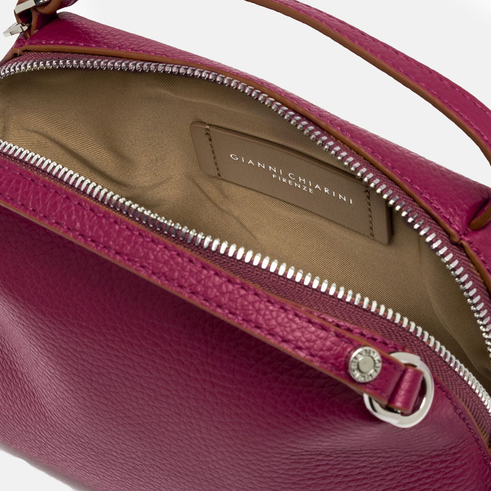 pink leather handbag with matching leather strap