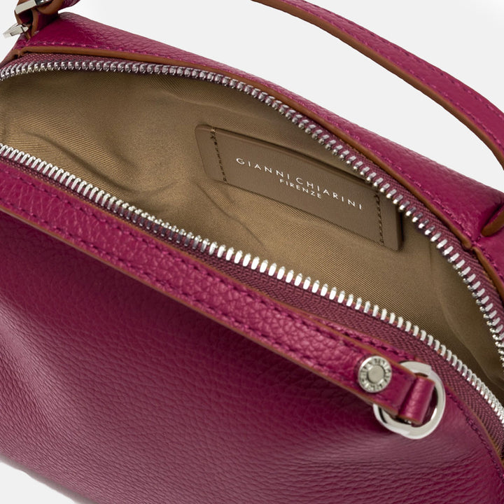 pink leather handbag with matching leather strap