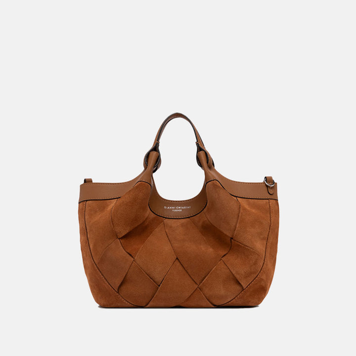 Brown woven chamois handbag with matching strap on a light grey background