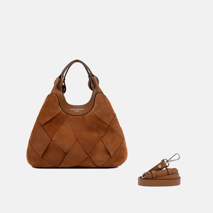 Brown woven chamois handbag with matching strap on a light grey background