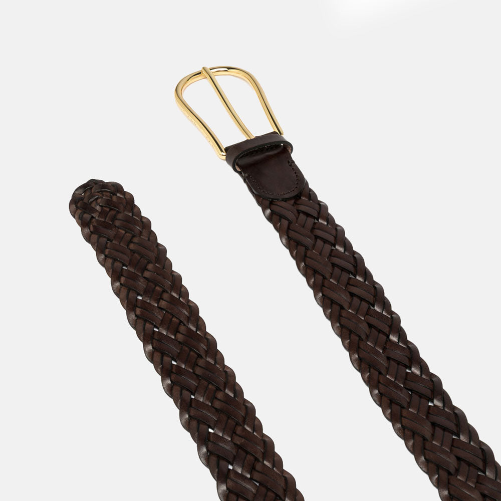Brown braided belt with a gold buckle on a white background