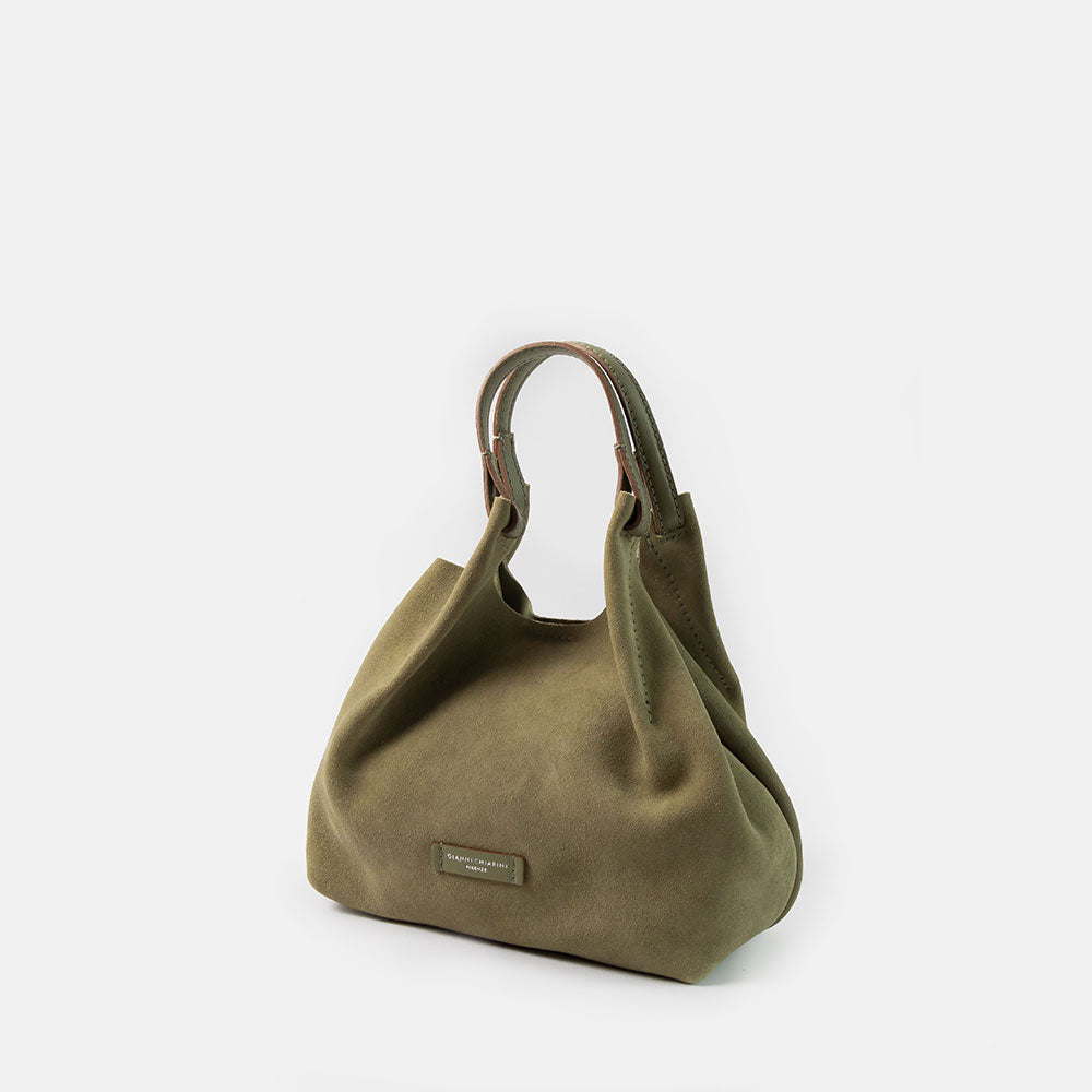 green suede bucket style handbag with green leather handle