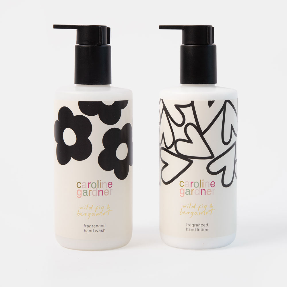 caroline gardner gift set of wild fig & bergamot fragranced hand wash & hand lotion with black flower and hearts designs