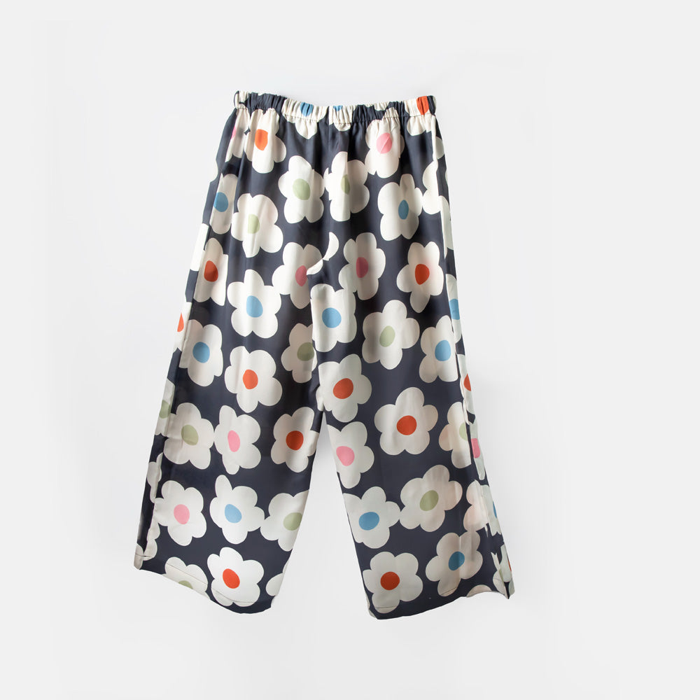 Floral-patterned pants on a white background