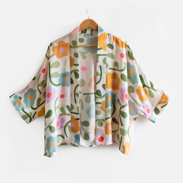Colorful floral-patterned kimono on a white background