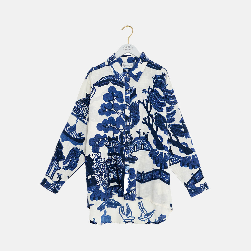 women's oversized long-line shirt in blue japanese style print with dropped shoulders and dipped hemline