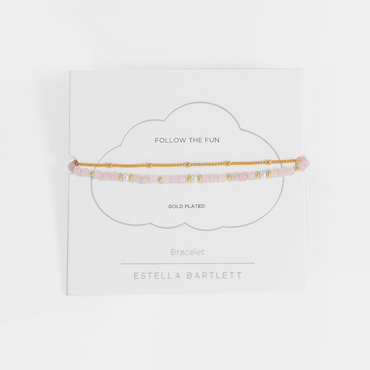 Gold-plated bracelet on a white card with 'Estella Bartlett' branding