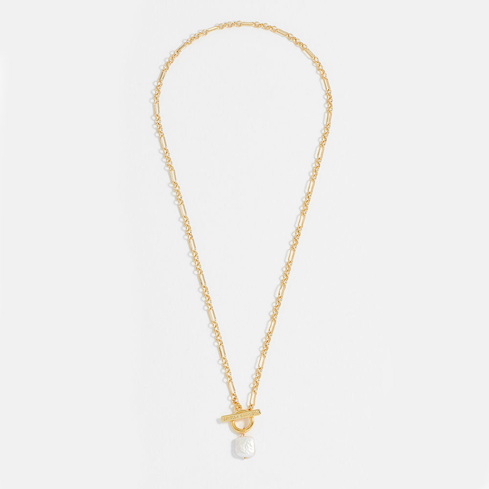 Gold necklace with a pearl pendant on a white background