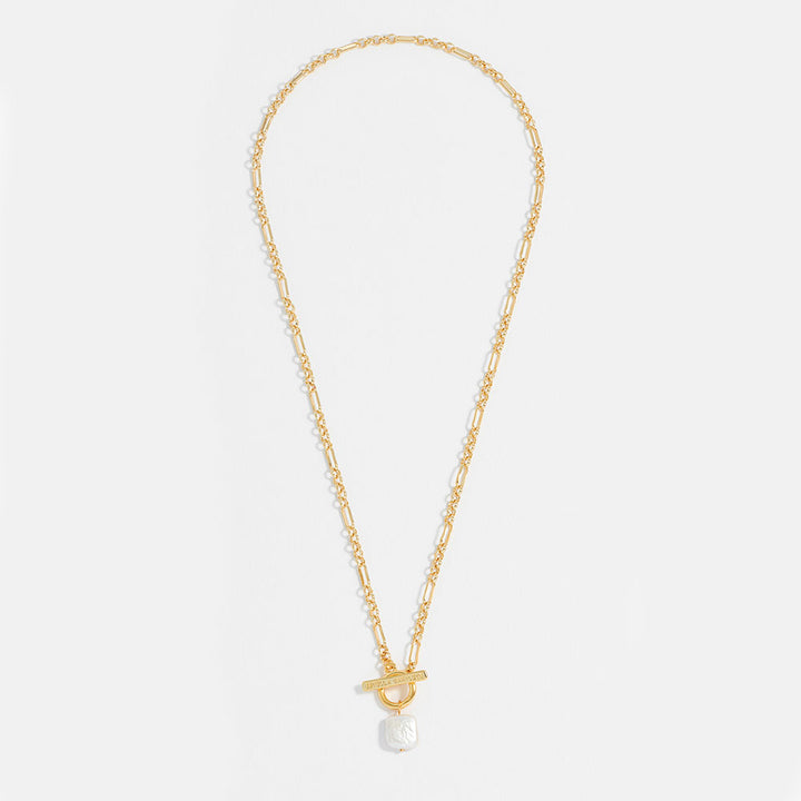 Gold necklace with a pearl pendant on a white background