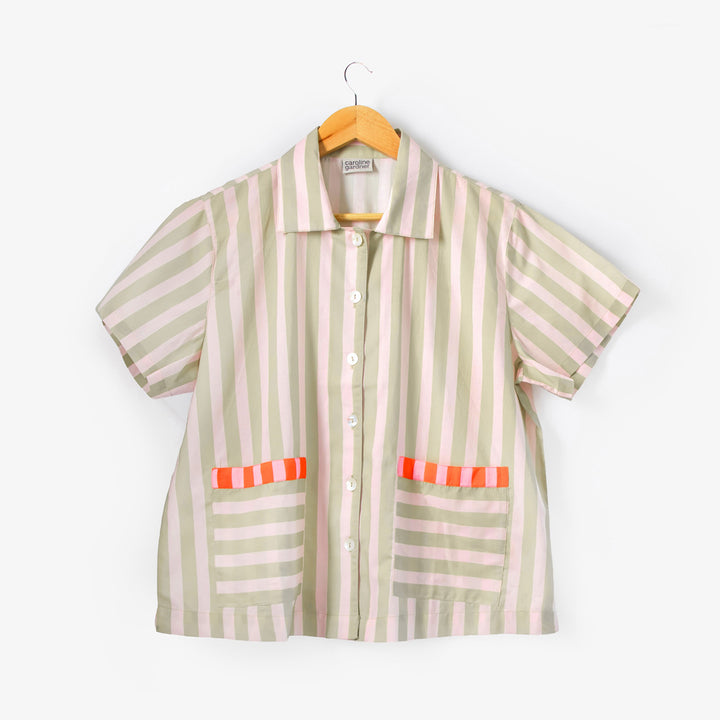 Striped pyjama shirt on a white background