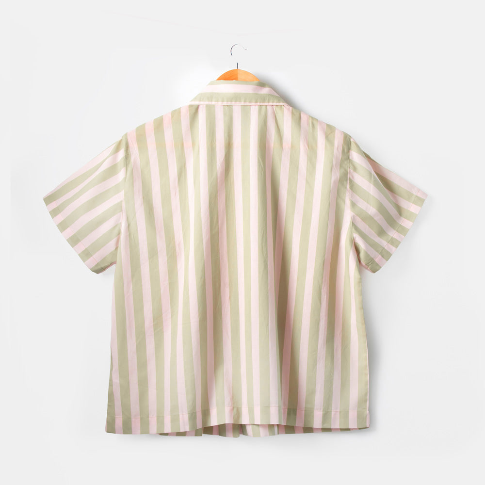 Striped pyjama shirt on a white background