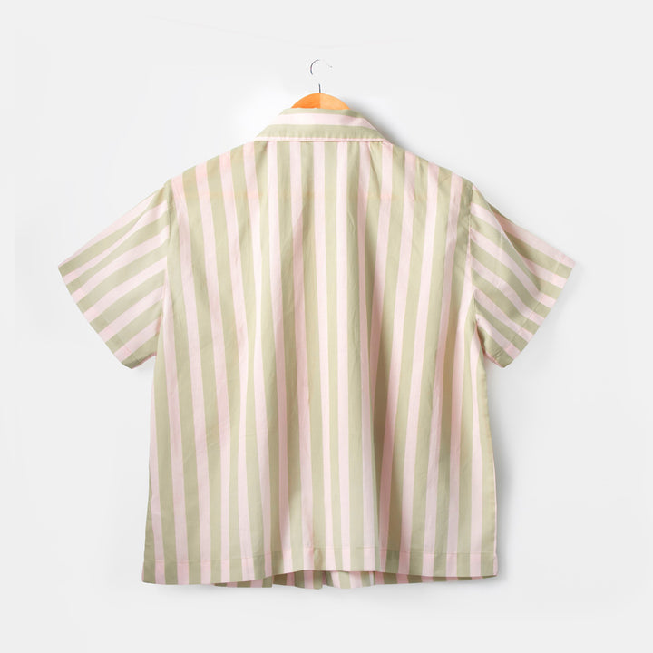 Striped pyjama shirt on a white background