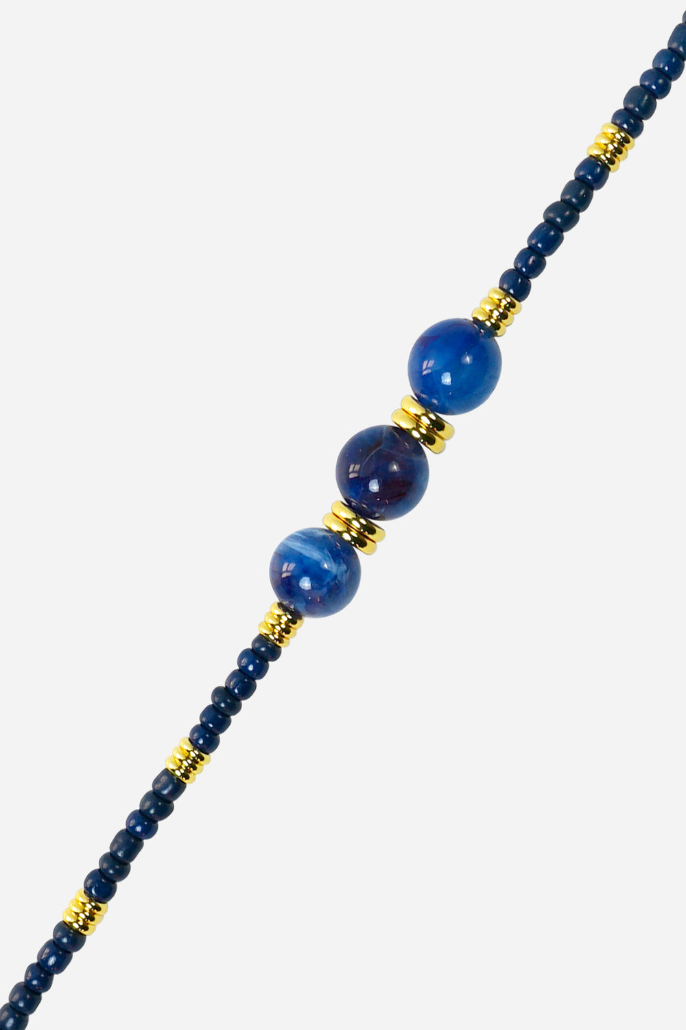 phone chain with blue and gold beads on a white background