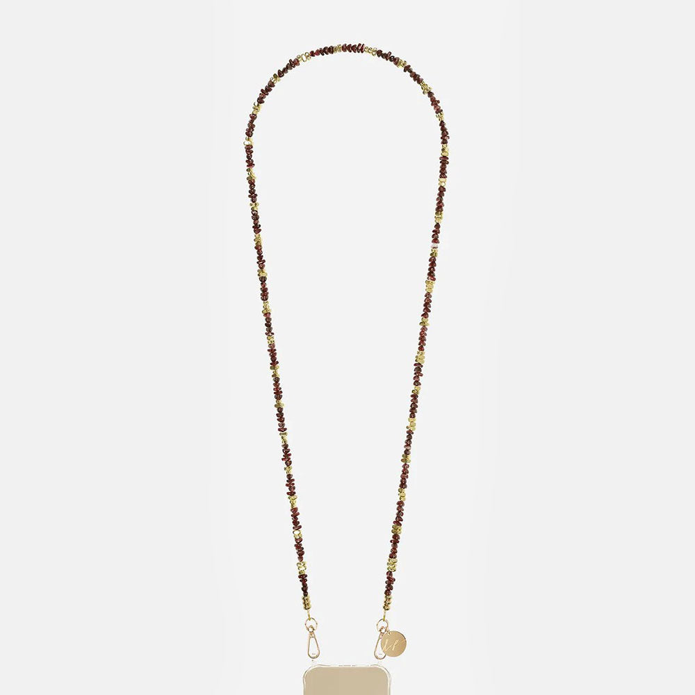 Beaded long phone chain on a white background