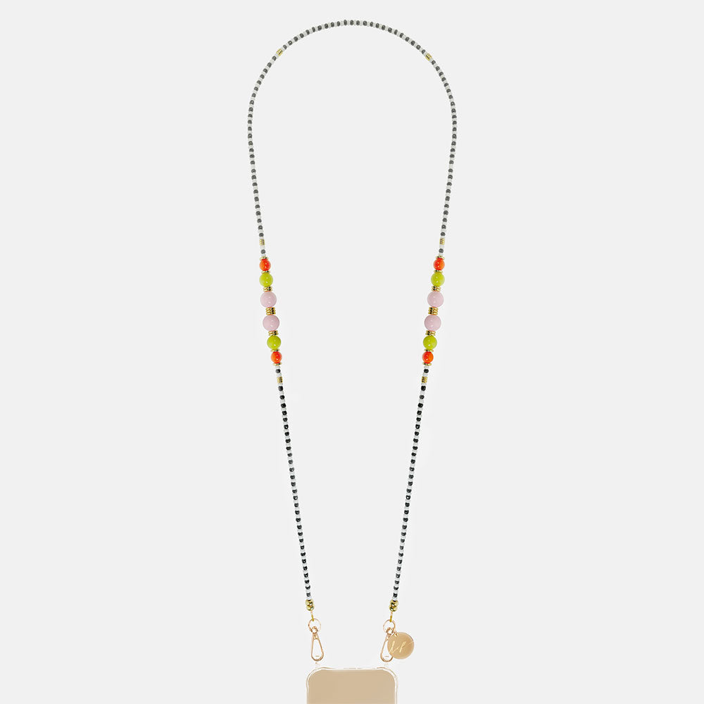 Phone chain with colourful beads and a gold charm on a light grey background