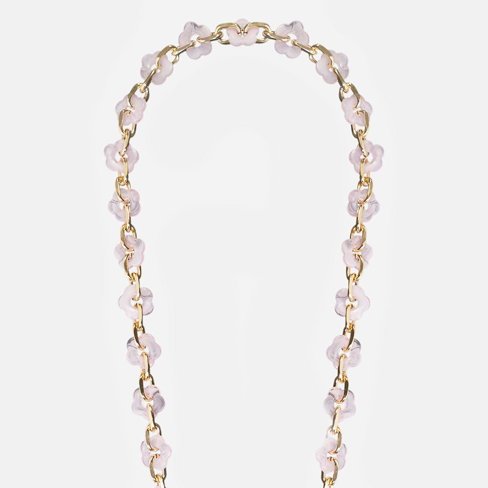 phone chain with gold chain and pink resin flowers on a light grey background