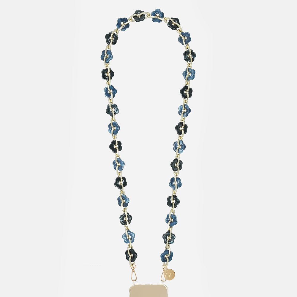 phone chain with blue and black floral beads on a white background
