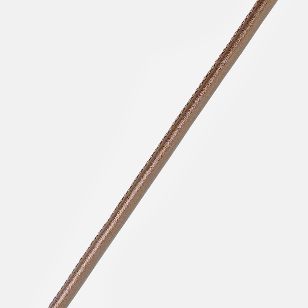 metallic bronze vegan leather long phone cord on a light background