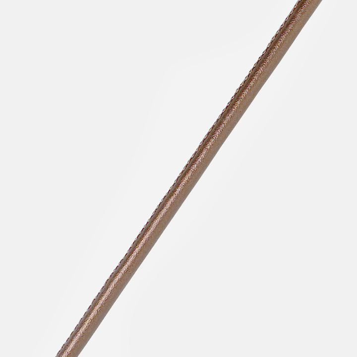 metallic bronze vegan leather long phone cord on a light background