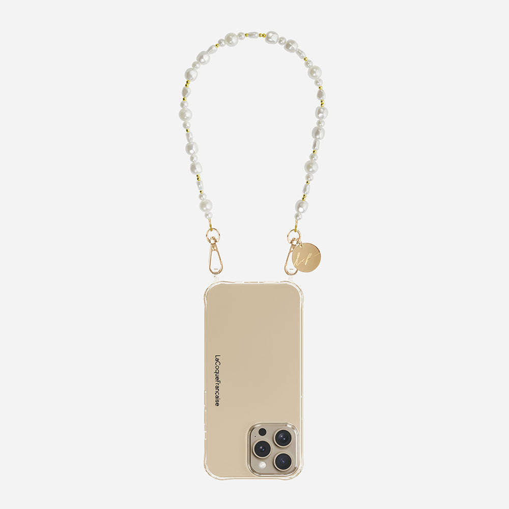 short phone chain with mother of pearl beads and gold hardware on a light grey background