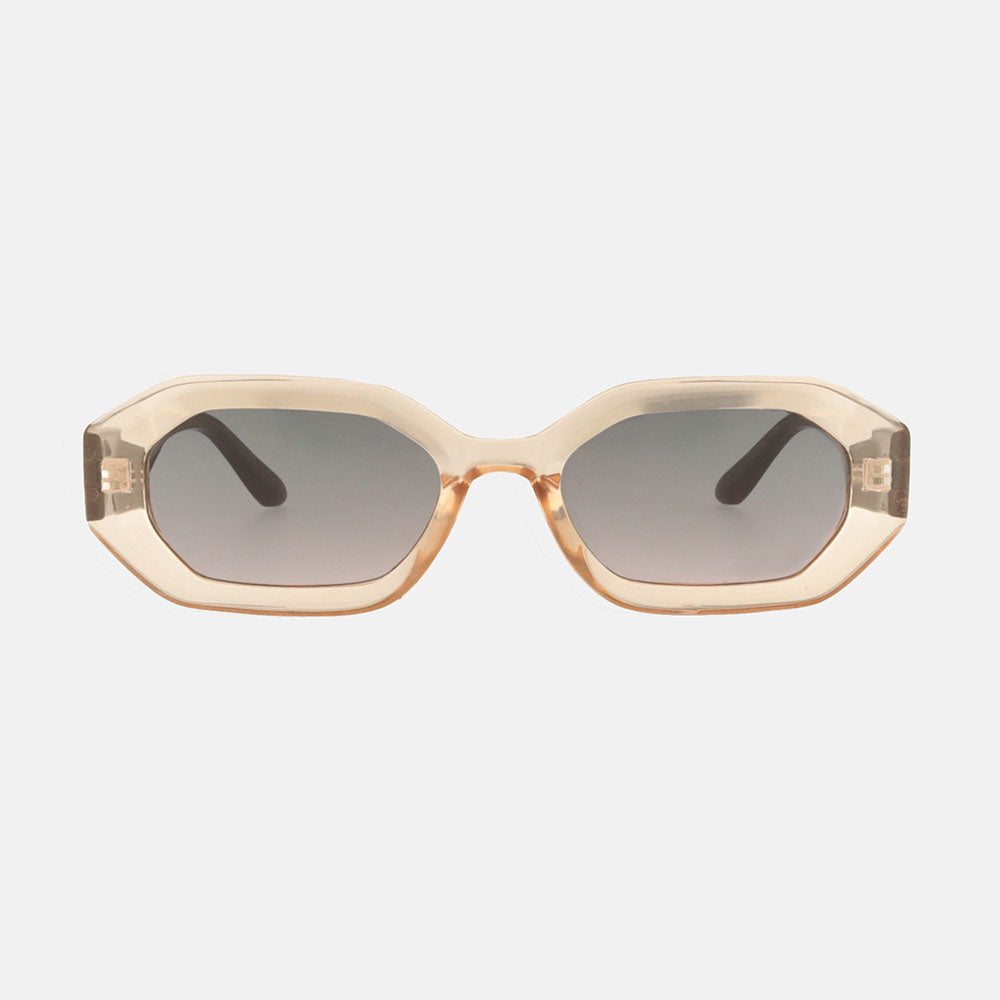 Sunglasses with a beige frame and dark lenses on a white background