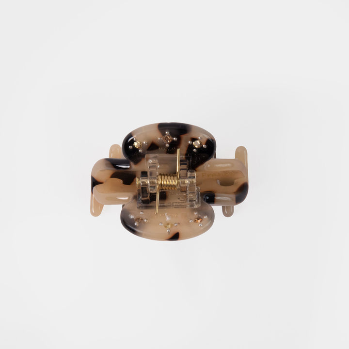  Tortoiseshell patterned hair clip set with mini crystals on a white background