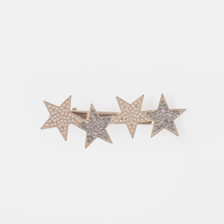 silver hair clip with 4 stars set with mini crystals and pearls on a white background