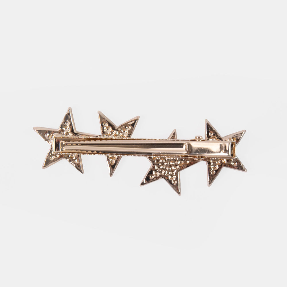 silver hair clip with 4 stars set with mini crystals and pearls on a white background