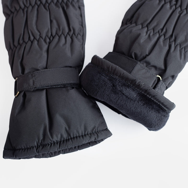 Close-up of black padded mittens showing the wrist strap and soft black fleece lining.