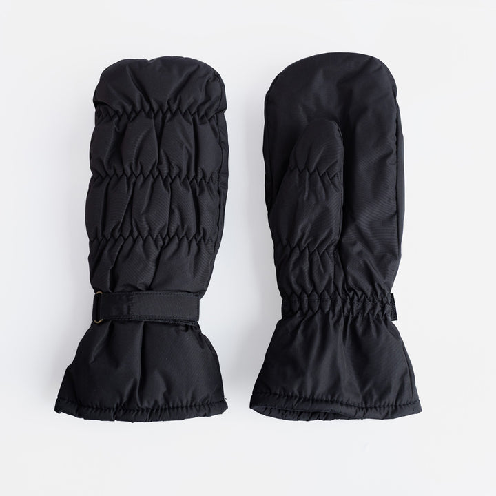 A pair of black padded mittens with a ruched, quilted finish and adjustable wrist strap, on a light grey background.
