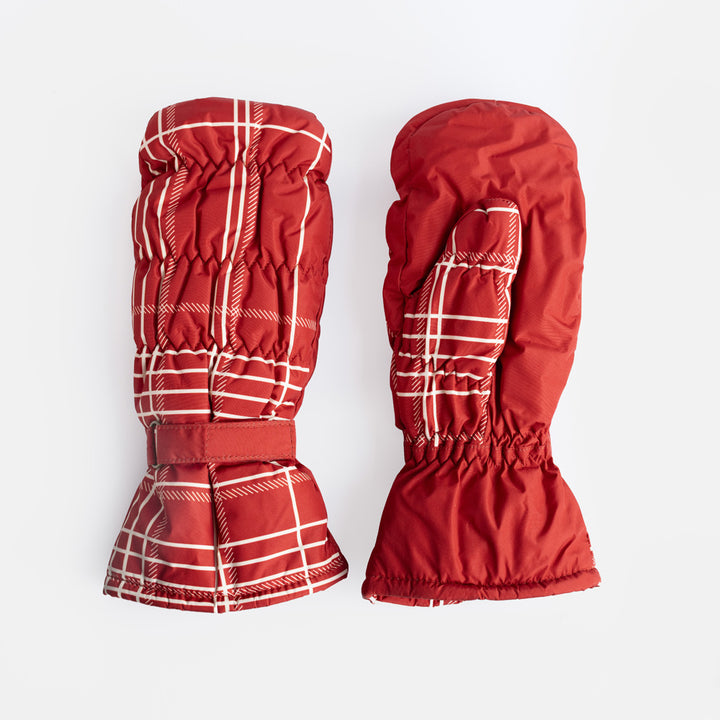 A pair of red padded mittens with a white check print, ruched quilted finish and wrist strap, on a light grey background.