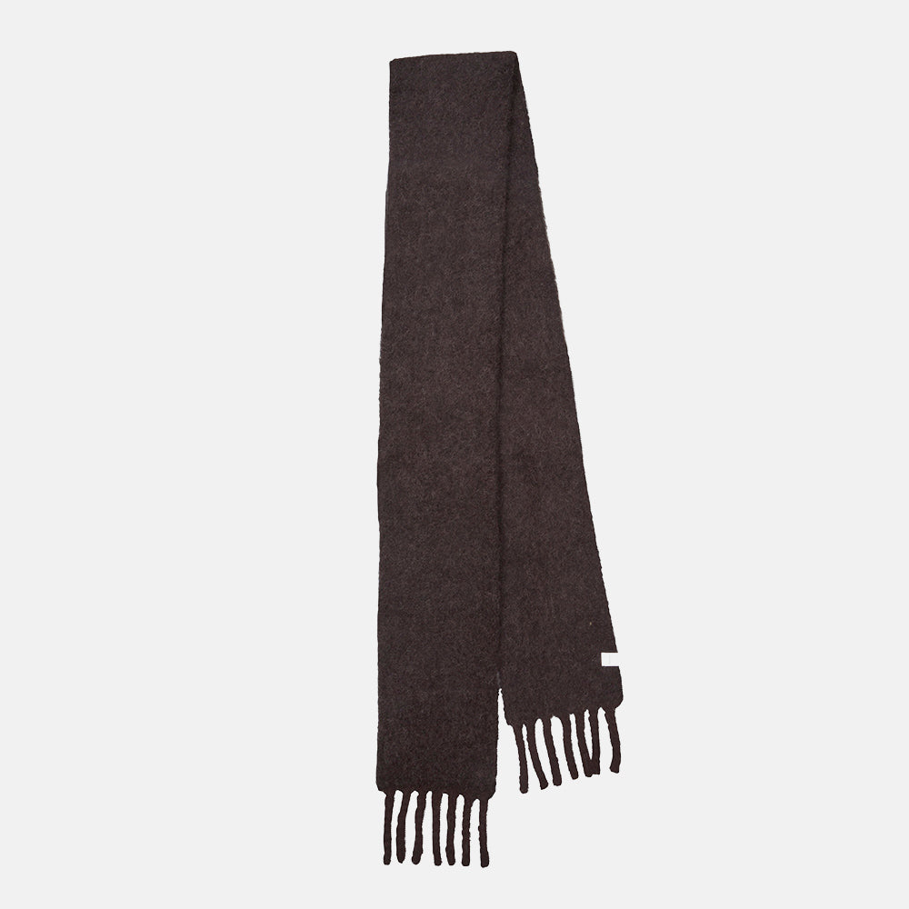 A long slim chocolate brown scarf with fringed ends, folded on a light grey background.