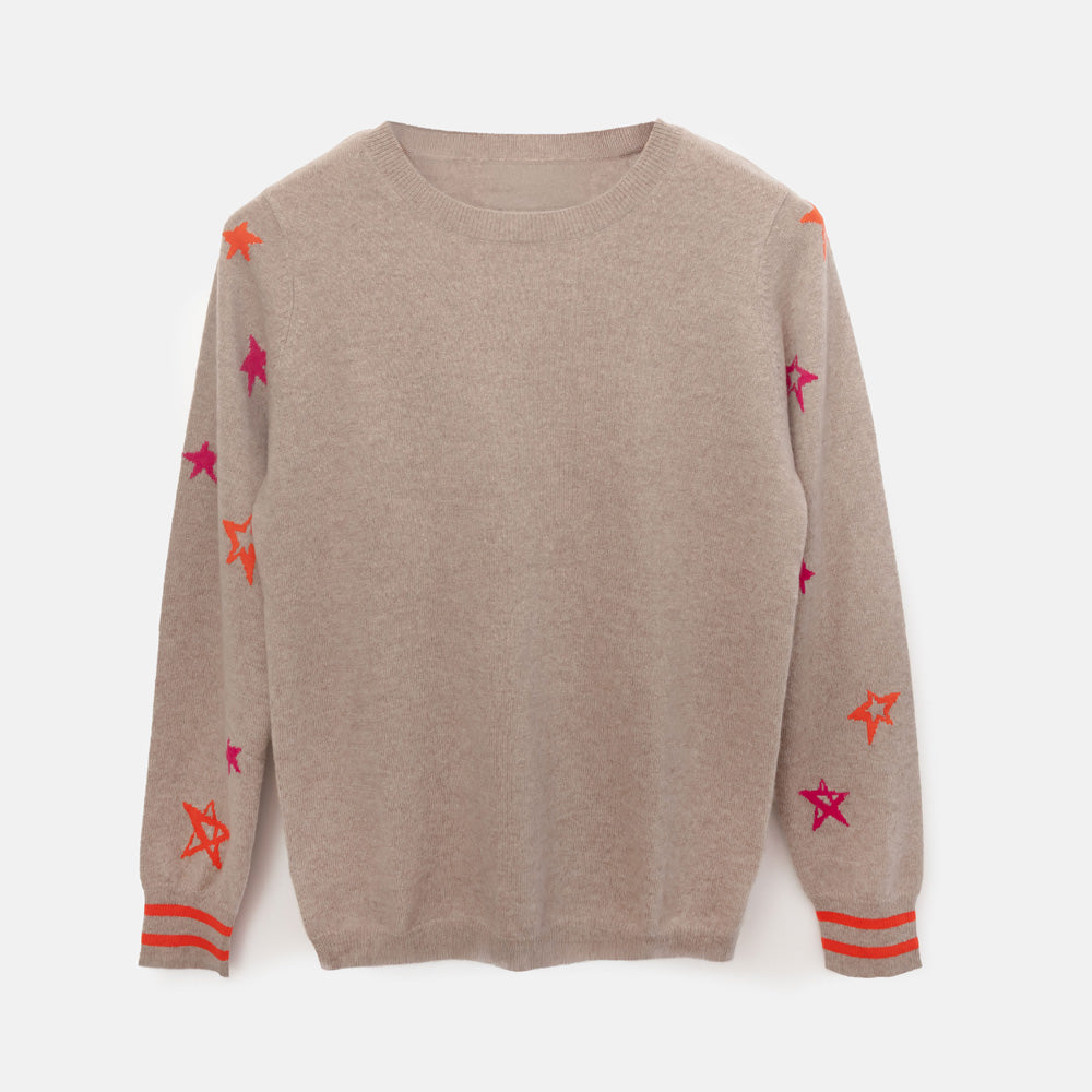 A beige crewneck sweater with embroidered star motifs in pink and orange on the sleeves, finished with orange striped cuffs, shown against a plain white background.