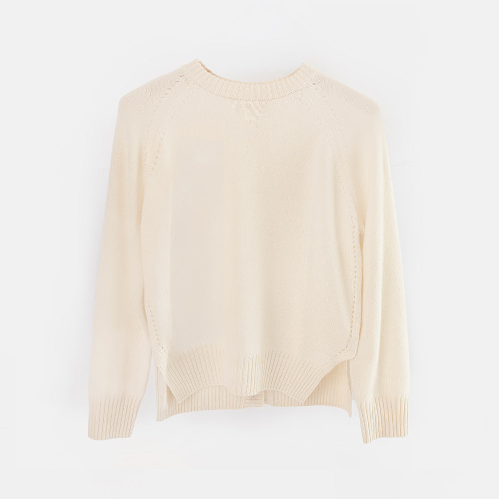 An off-white knit cardigan sweater with a mock neck, raglan sleeves, and a button-up back, displayed on a clean white background.