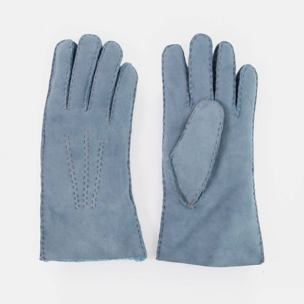 A pair of slate blue suede gloves shown flat against a clean white background, displaying both the back of one glove and the palm/thumb side of the other.