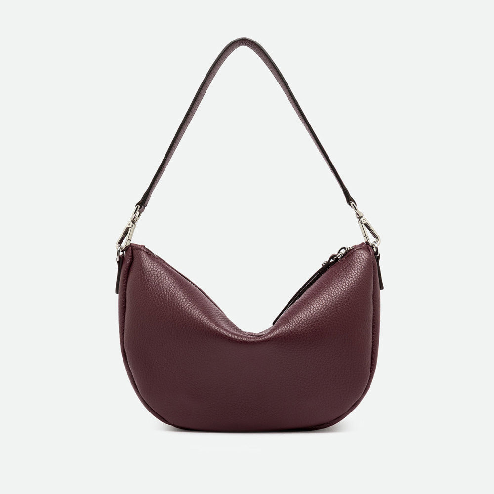 Back of a burgundy leather half moon shoulder bag