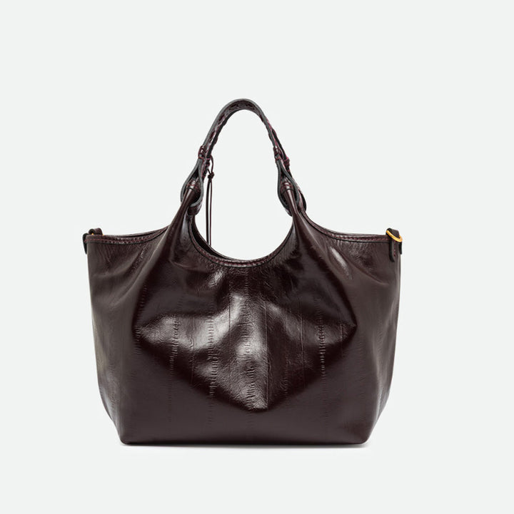 Front of a glossy dark burgundy tote bag with its sides opened out