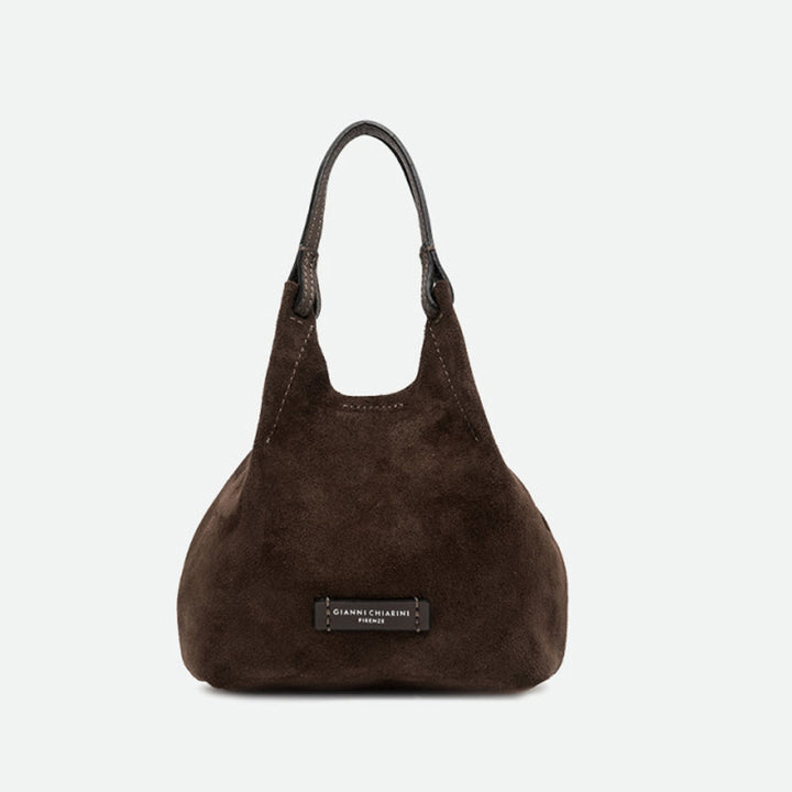 Small dark brown suede tote bag with leather handles and a slouchy shape