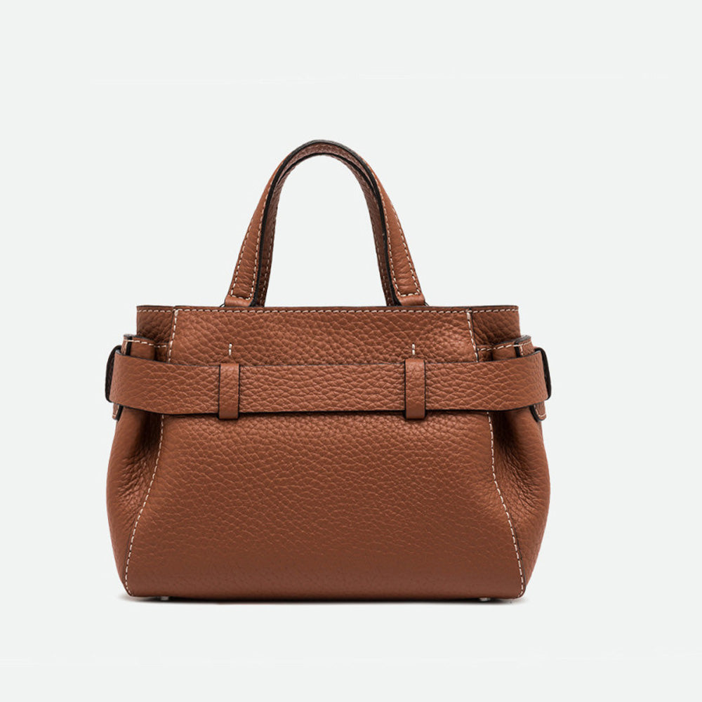 Back of a structured tan pebbled leather top handle bag