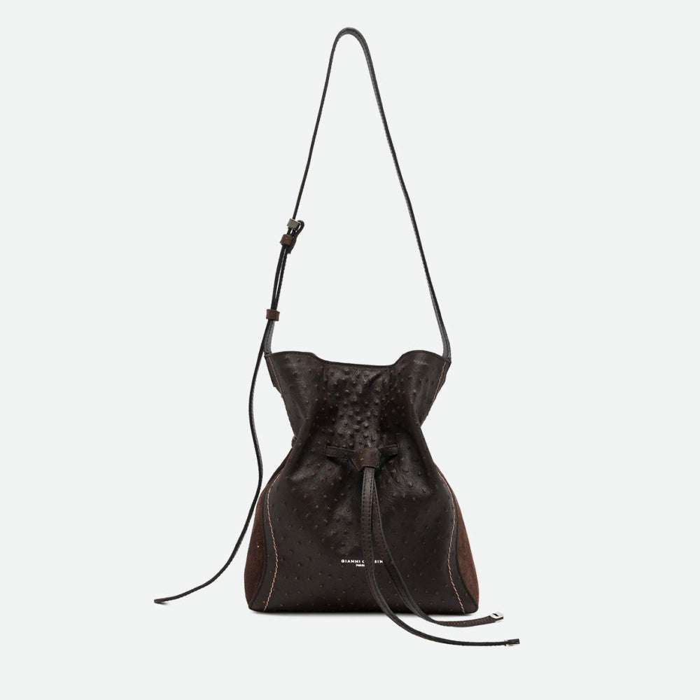 Dark brown textured leather drawstring bucket bag with a long shoulder strap