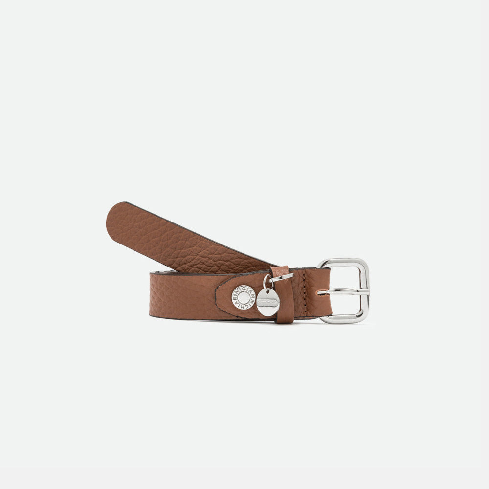 Rolled tan leather belt with a silver square buckle and round silver charm