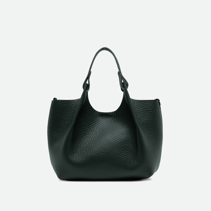 Front of a dark green pebbled leather tote with its sides opened out